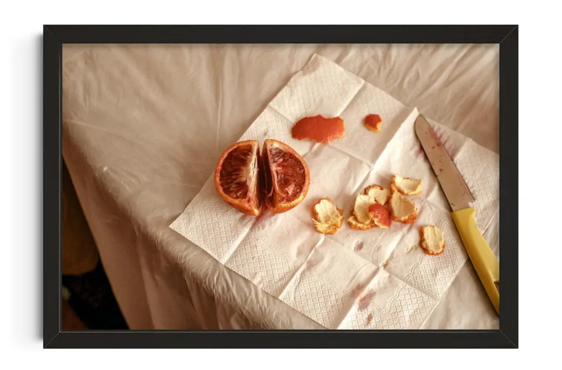 Sharing a blood orange in China contemporary art print by Julian Zerressen - sold by DROOL