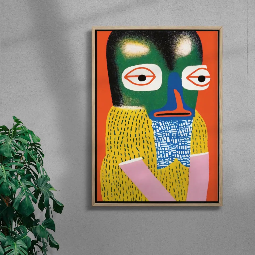 Abstract artwork with a colorful face on a gray wall, featuring a plant to the left.